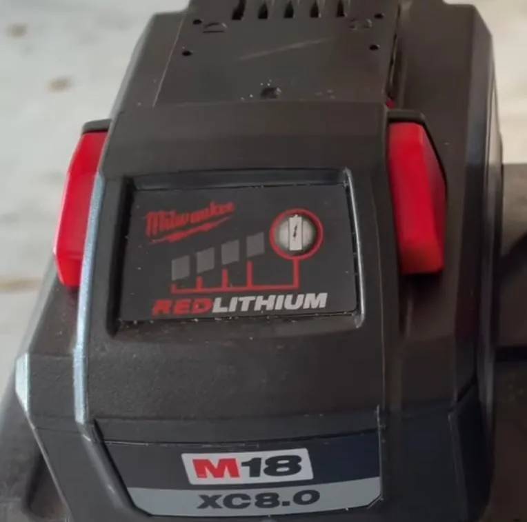 fake milwaukee battery release button